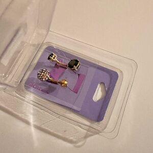 Claire’s dual jeweled belly rings